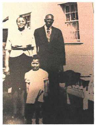 Historical family photograph of the Bulah family outside their home